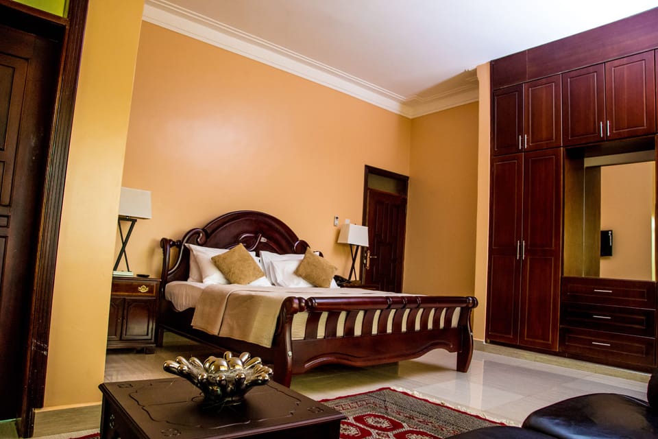 Deluxe Double Room | Minibar, desk, laptop workspace, blackout drapes