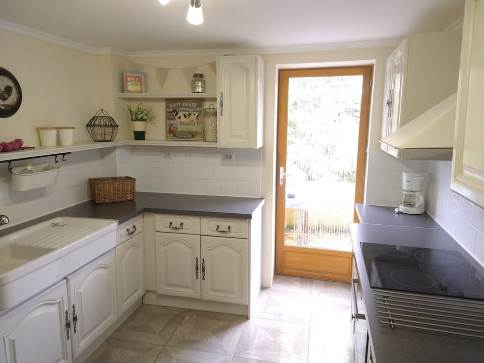 Kitchen leading to balcony