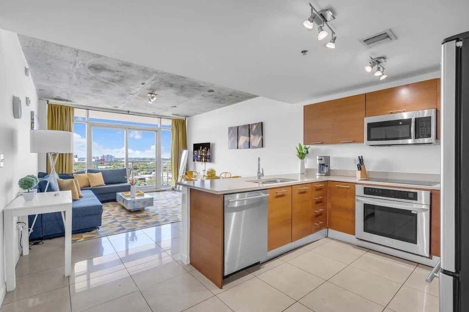 "Cook, relax, and enjoy city views in this Airbnb rental with modern kitchen and cozy living space."


