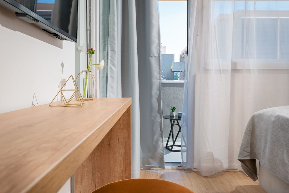 Deluxe Double or Twin Room, Balcony, City View | 1 bedroom, premium bedding, down comforters, in-room safe