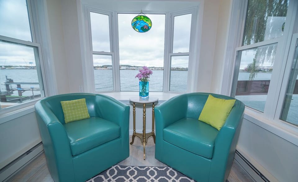 These barrel chairs swivel, so you can face the interior, or view the Bay!