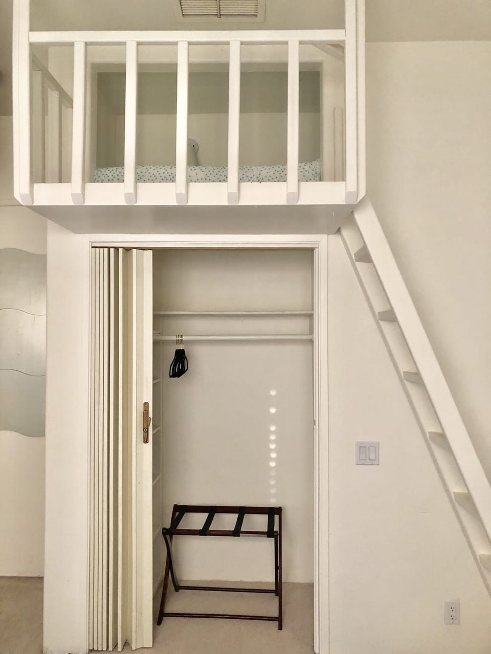 Upstairs in the loft is a twin bed sleeps one adult or child 