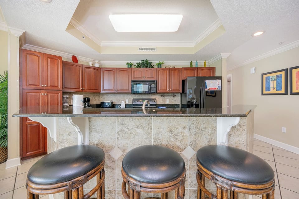 Sip your morning coffee at the breakfast bar and get ready for a day of adventure in this stylish space