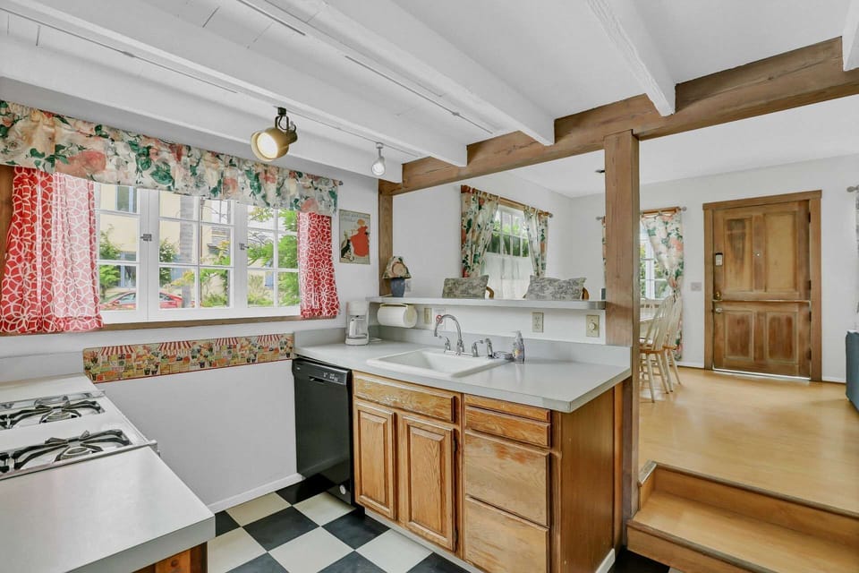 From the kitchen you can see the entire downstairs and out the front door!