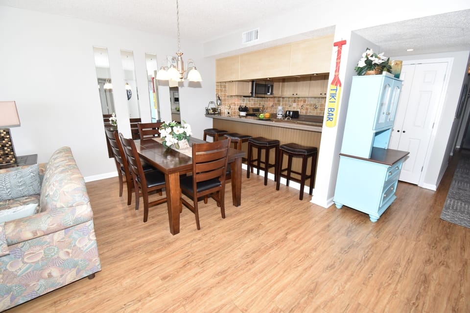 Dining table for 6 with extra bar seating.