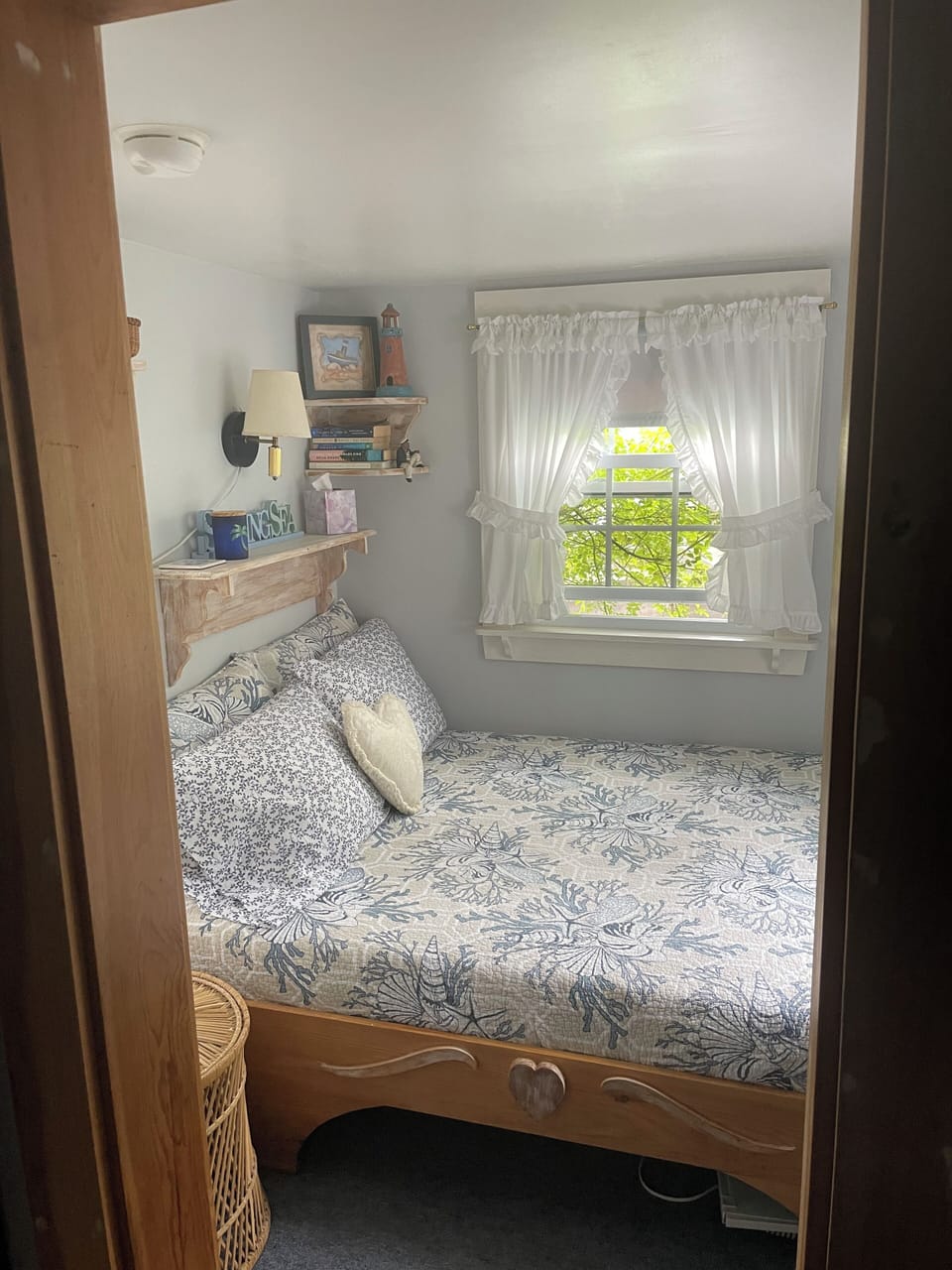 Entrance to bedroom thru bath (step down) to built in double bed