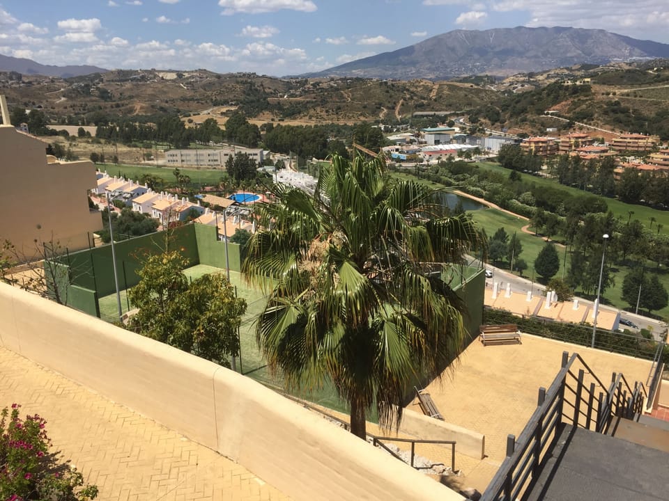 Paddle tennis court.
