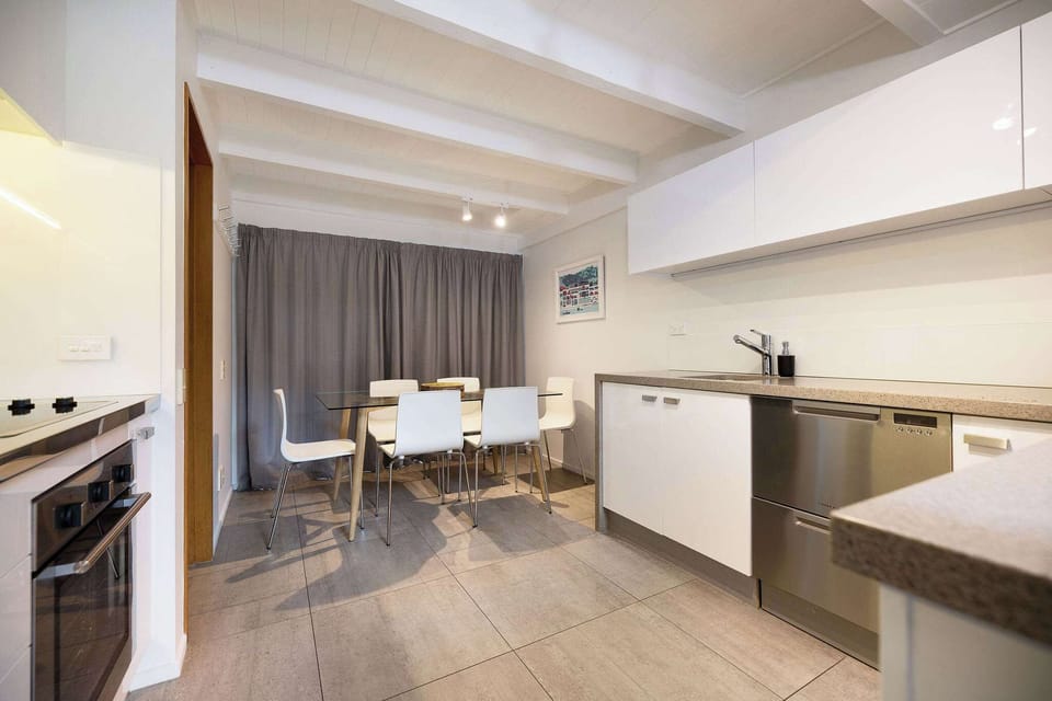 Kitchen and dining area with table pulled out
