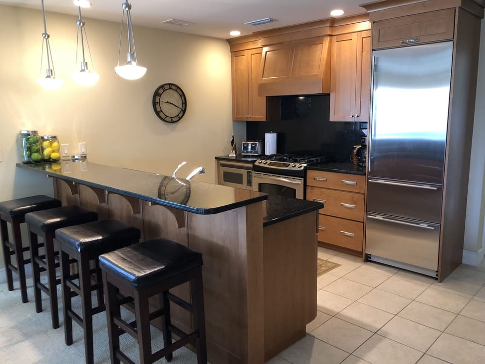 Stove, oven, microwave, 2-drawer dishwasher and Sub Zero fridge and freezer