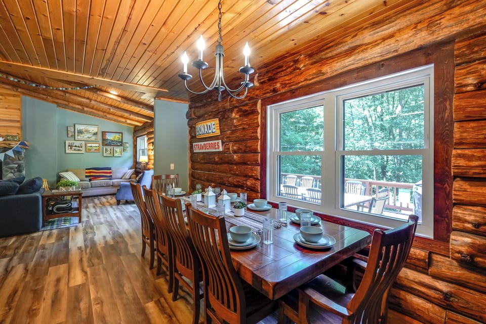 The table looks over the back deck and there is plenty of seating.