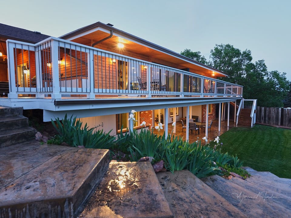 Deck access to living rm ,Master BR ,  hot tub, BBQ grill . 