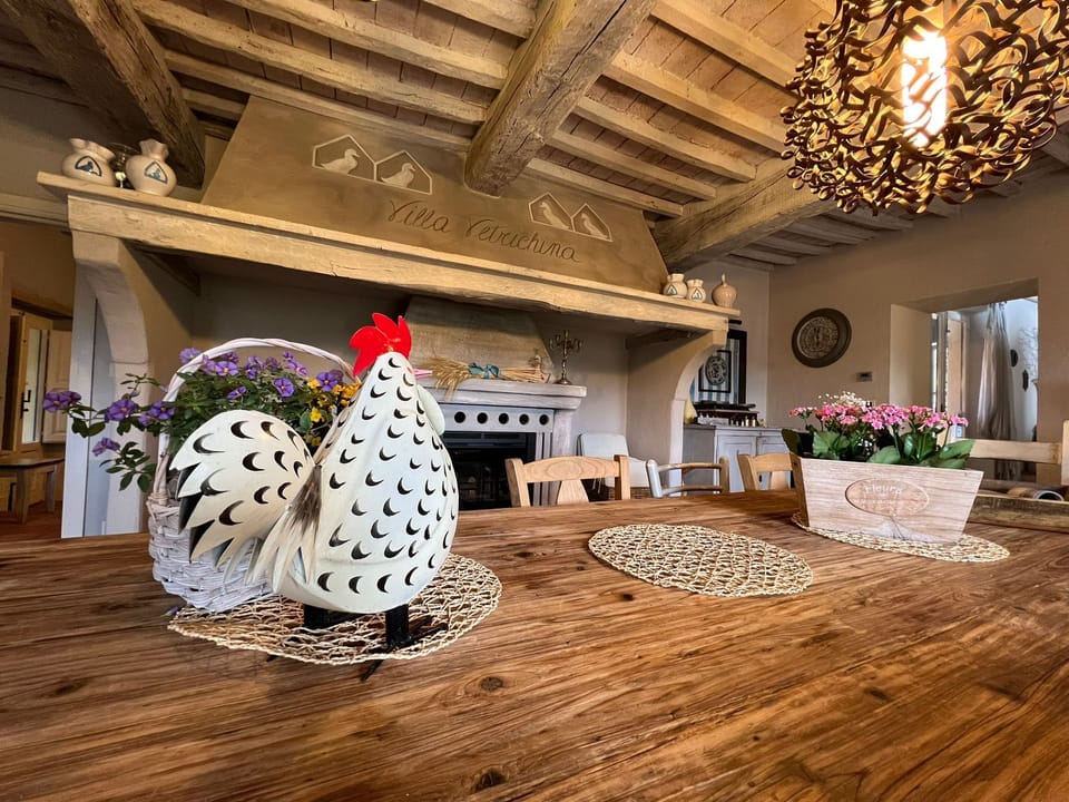 Table on main entrance and fire place