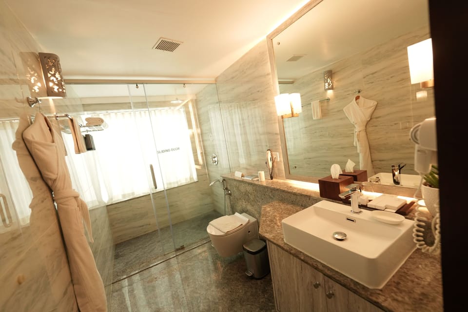 Shower, free toiletries, hair dryer, bathrobes