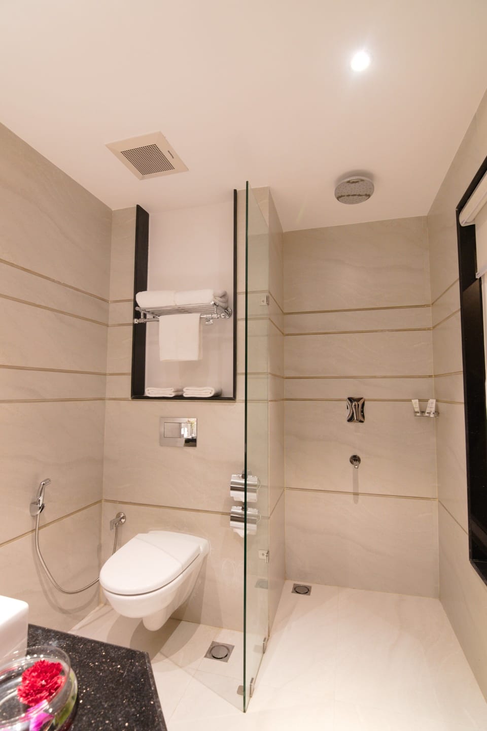 Shower, rainfall showerhead, towels