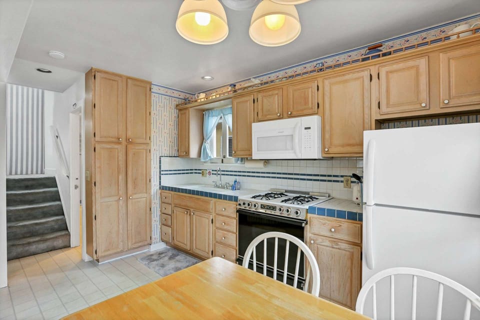 The kitchen could use a little facelift, but the refrigerator and the microwave are recently improved.