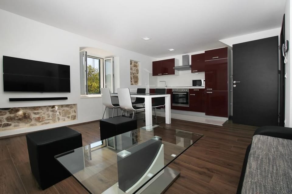 Superior Apartment, Marina View | Living area | 97-cm flat-screen TV with satellite channels, TV