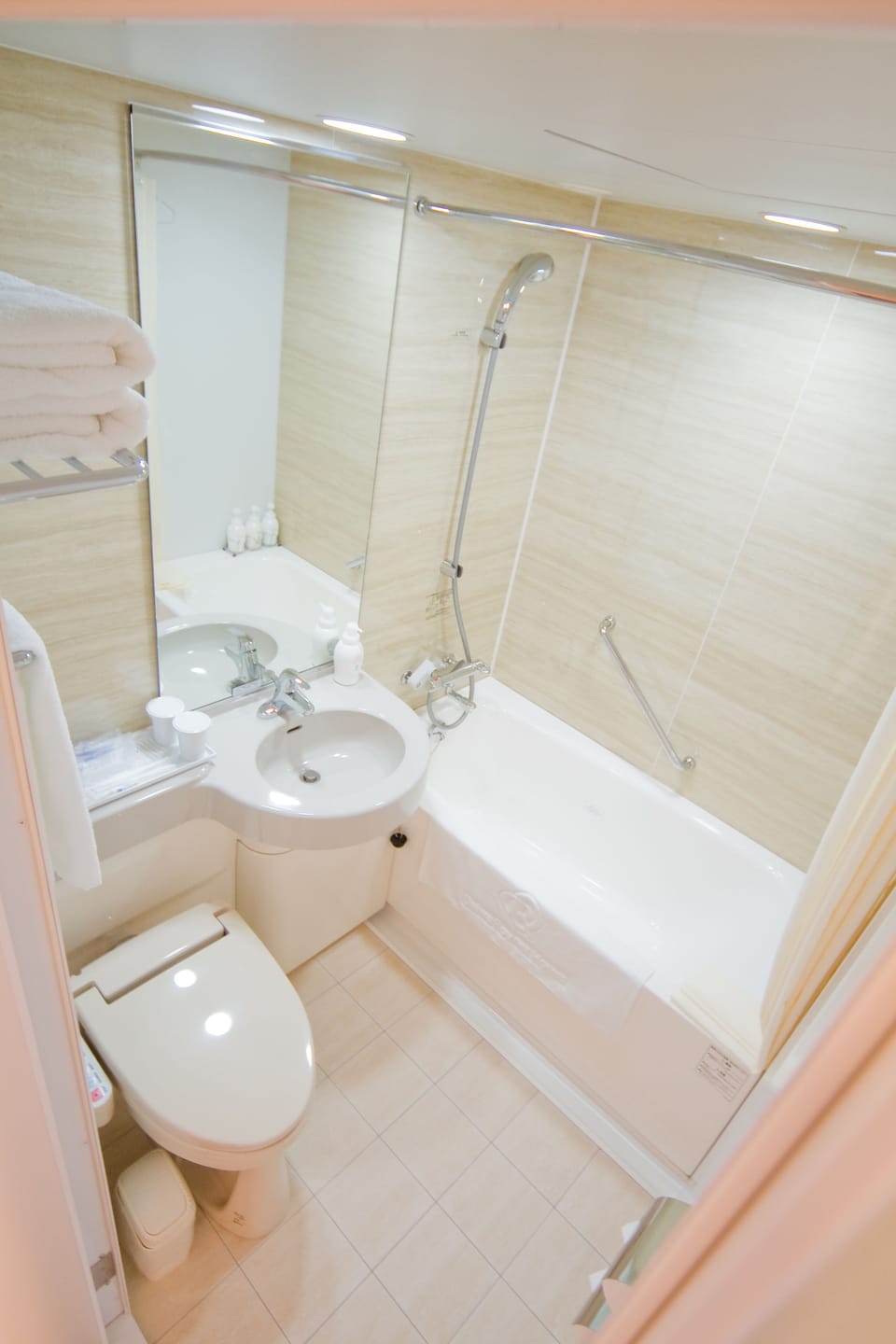Combined shower/tub, hair dryer, bathrobes, slippers