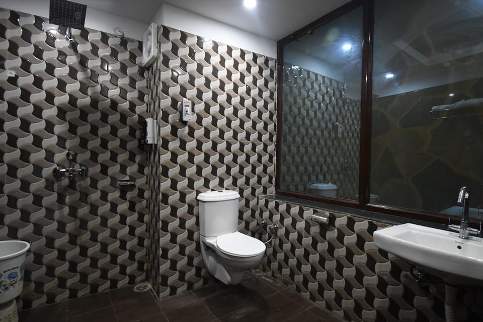 Premier Single Room | Bathroom | Shower, towels, soap, toilet paper