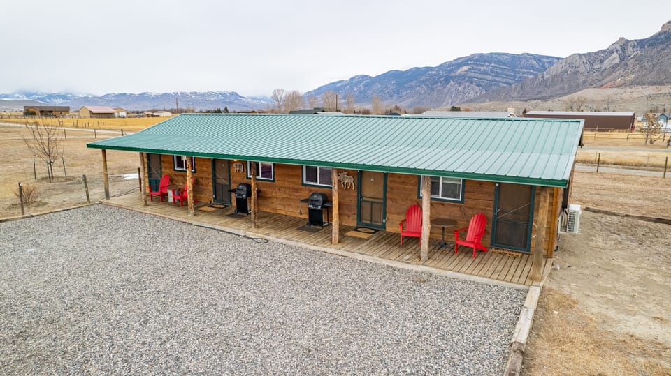 Cowboy Bunkhouse #1 and Cowboy Bunkhouse #2 each have outdoor porch areas, gas grills and parking