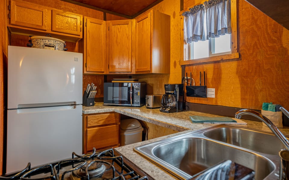 Enjoy your morning cup of coffee, make a picnic lunch for day trips to Yellowstone or BBQ the catch of the day at Cowboy Bunkhouse #1