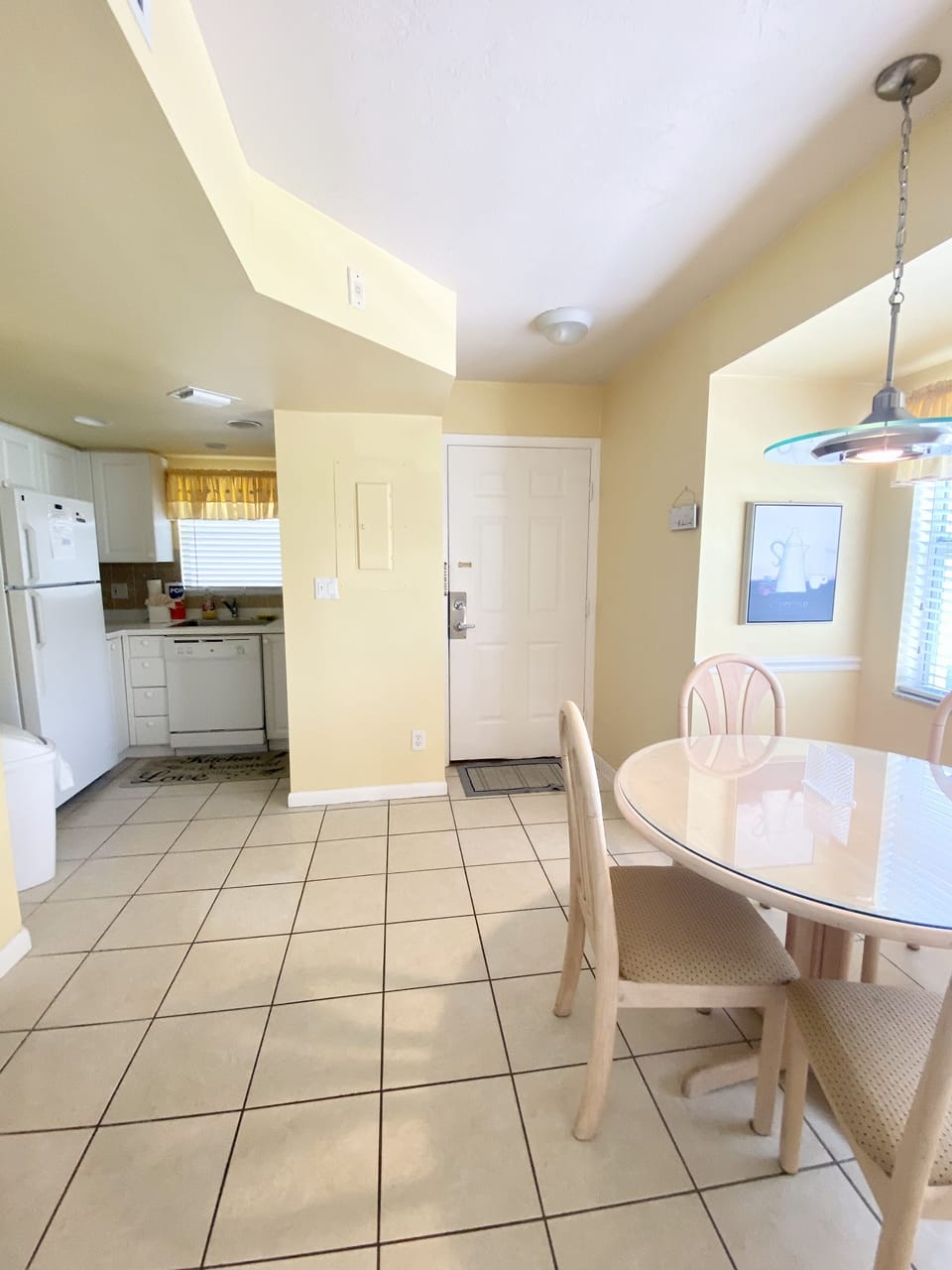 Kitchen, Entryway and Dining Area 
