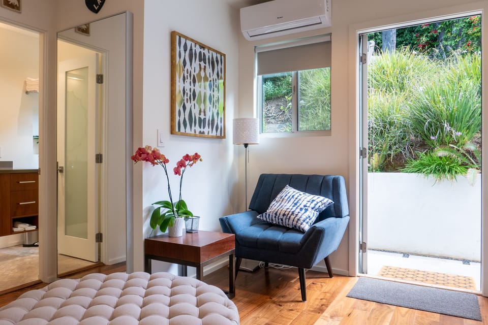 Groovy sitting area for television or reading a book.  Private bathroom