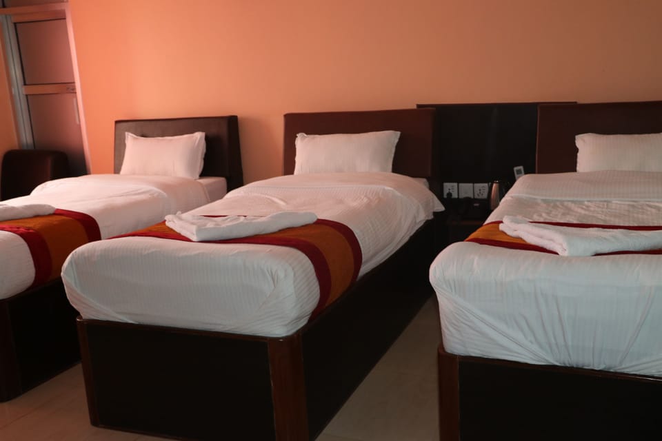 Family Double or Twin Room | Minibar, desk, iron/ironing board, free WiFi