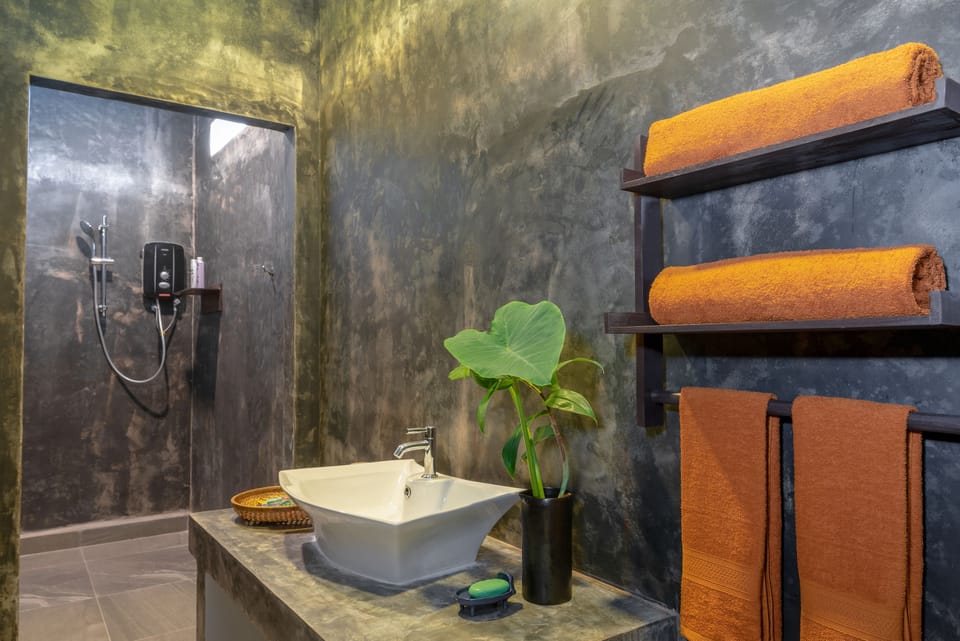 Shower, free toiletries, hair dryer, slippers