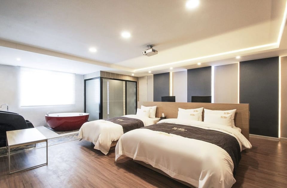 VIP (Family) | Premium bedding, down comforters, desk, laptop workspace