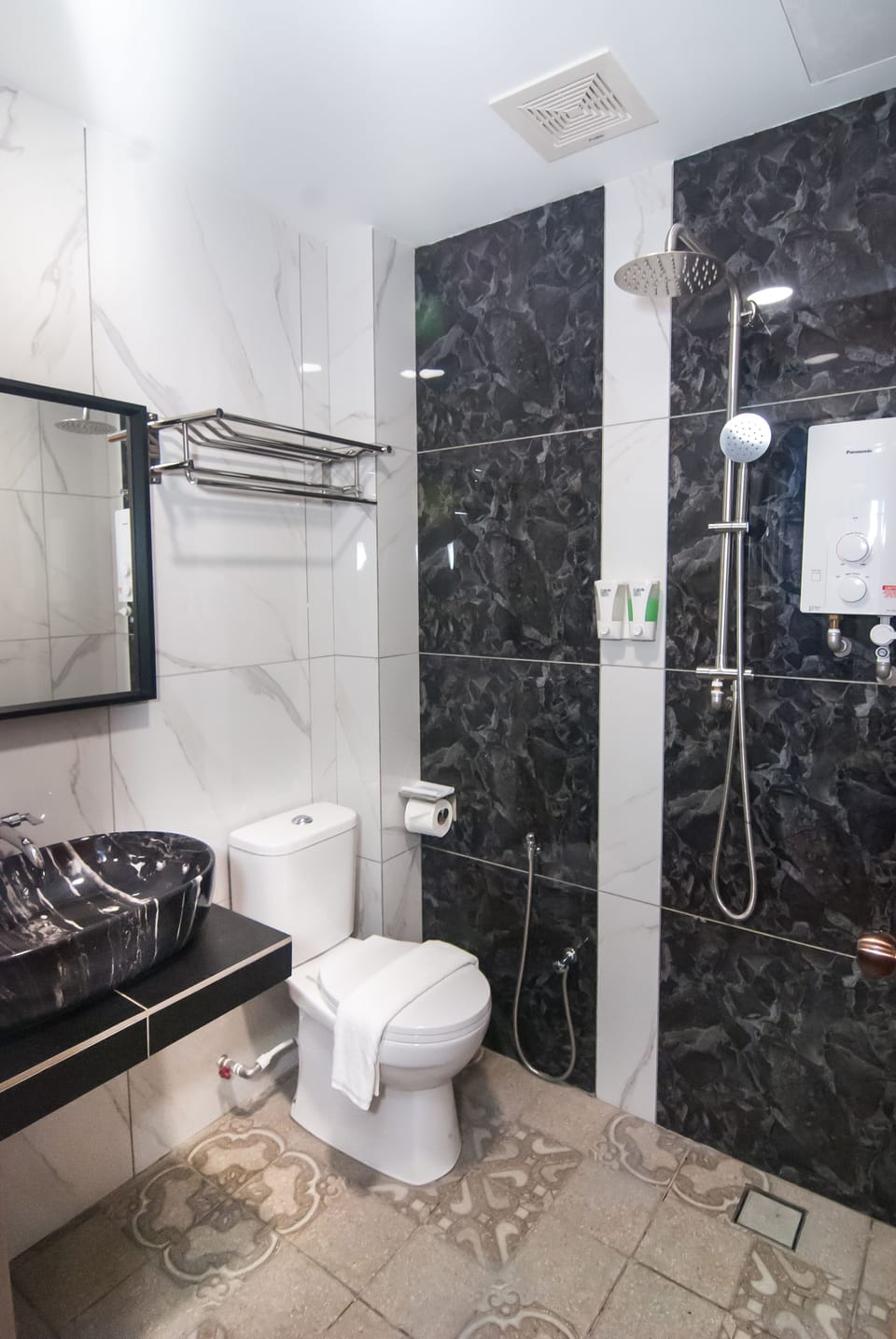 Shower, free toiletries, hair dryer, slippers