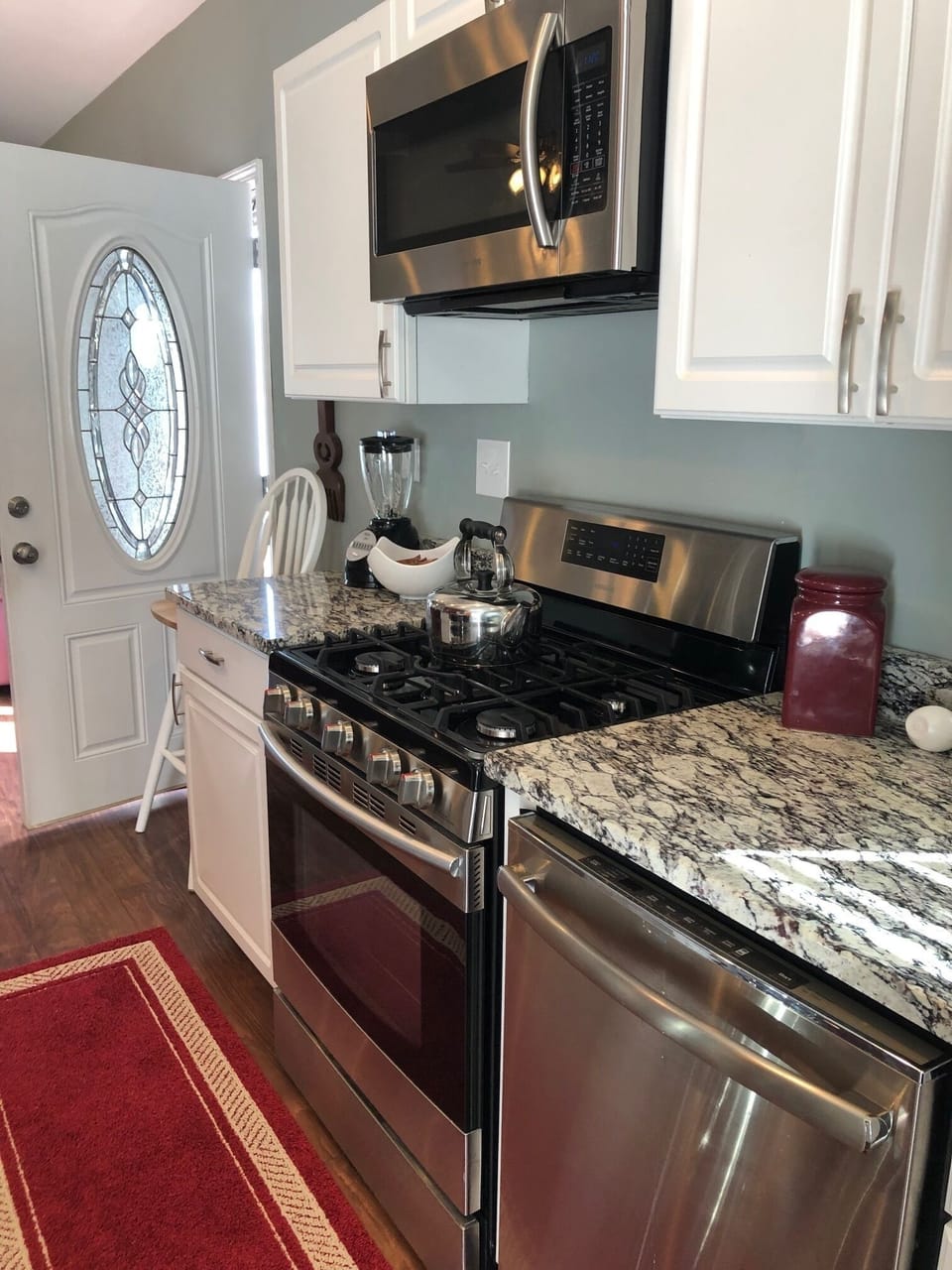 gas stove with overhead microwave