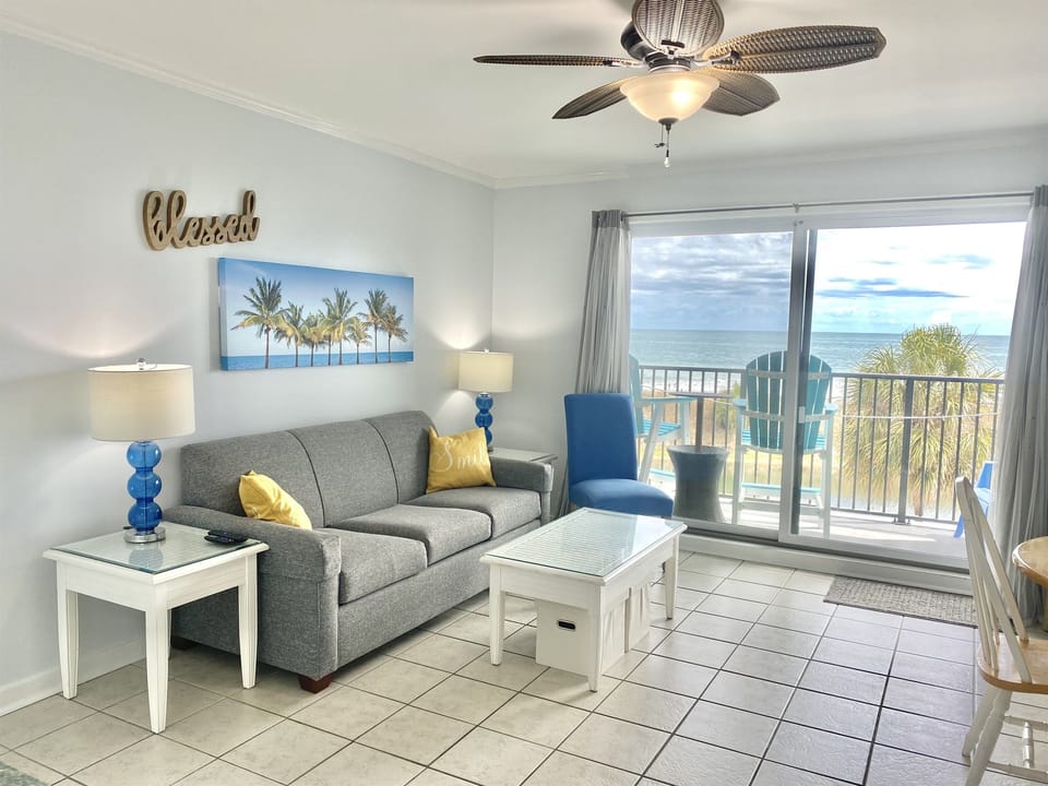 The condo is 550 square feet, with a welcoming view of the pond and Ocean!  The living space features, a full size pull out sofa sleeper, 50" Roku TV, & two storage cubes under the coffee table to double as a small table and chairs for small children.