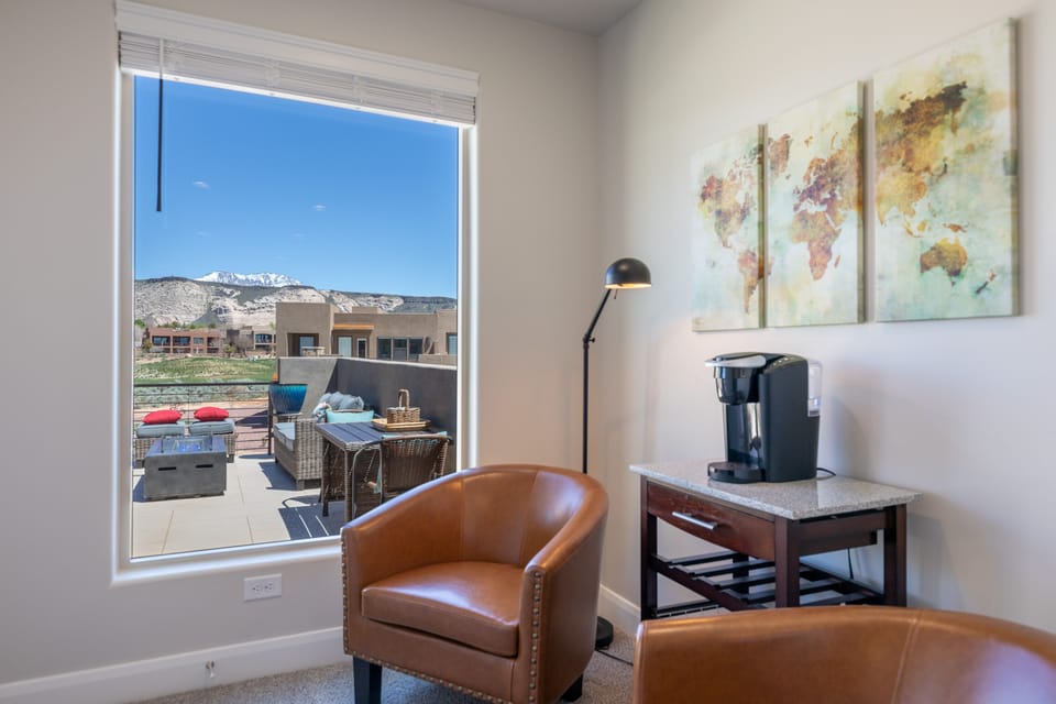 Upstairs Landing Area - The upstairs landing area has a beautiful view for you to relax and read a good book. Perfect spot for morning coffee, tea and reflection!