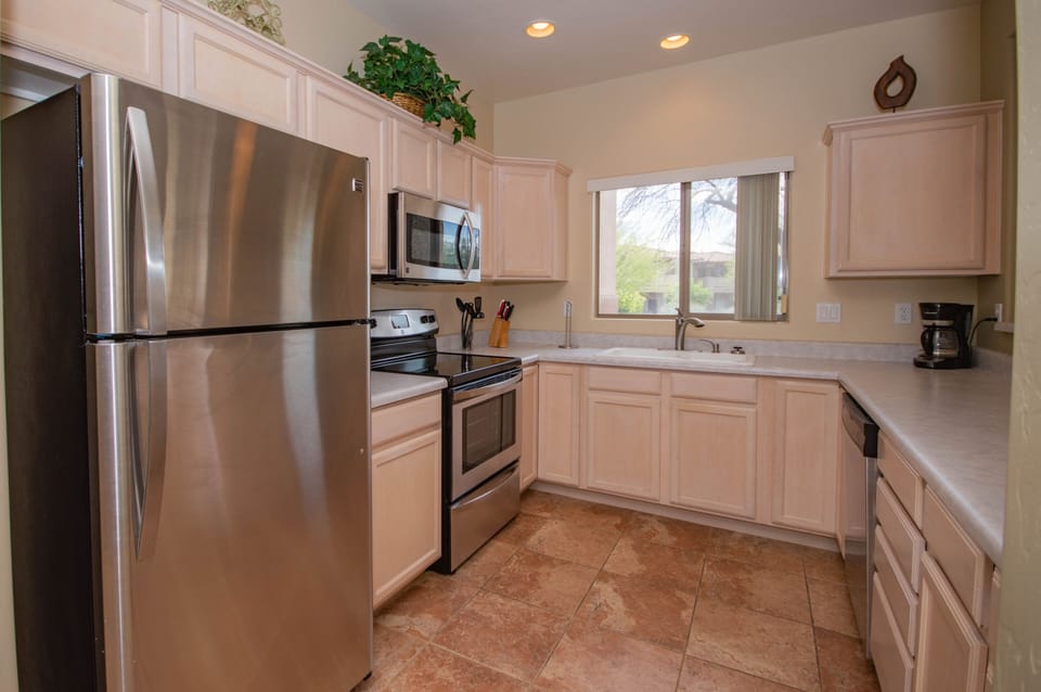 Beautiful kitchen with stainless steel appliances.