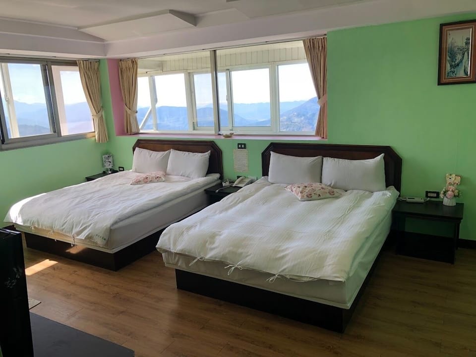 Standard Quadruple Room | Desk, blackout drapes, free WiFi, bed sheets