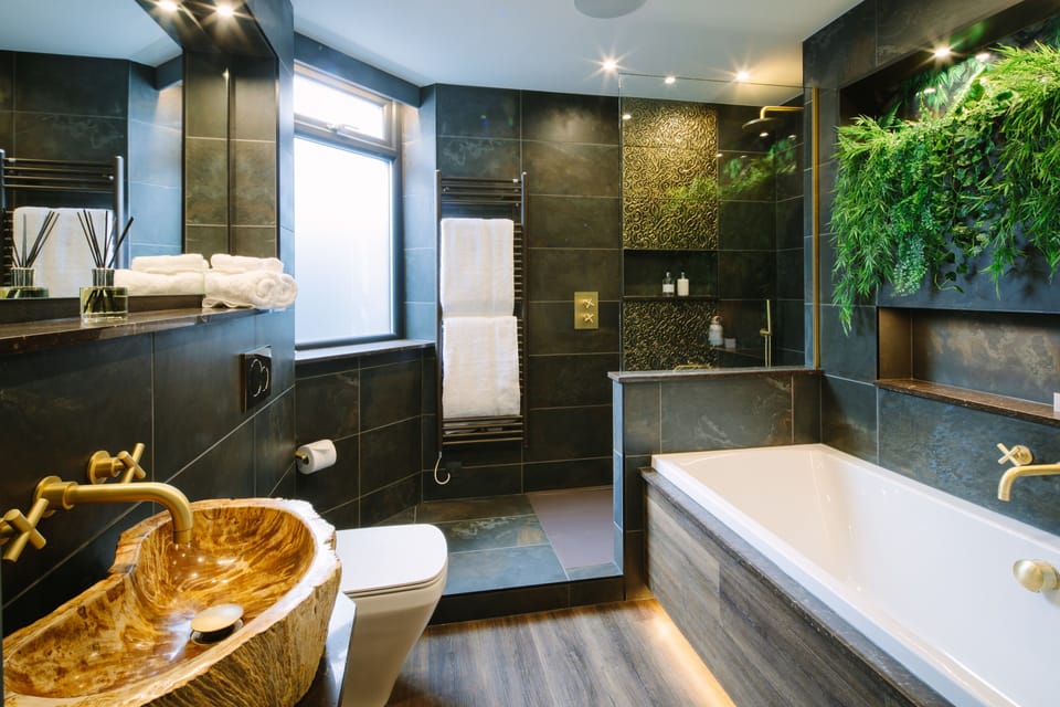 The Oasis Luxury Suite, 1 King Bed | Bathroom | Separate tub and shower, deep soaking tub, designer toiletries