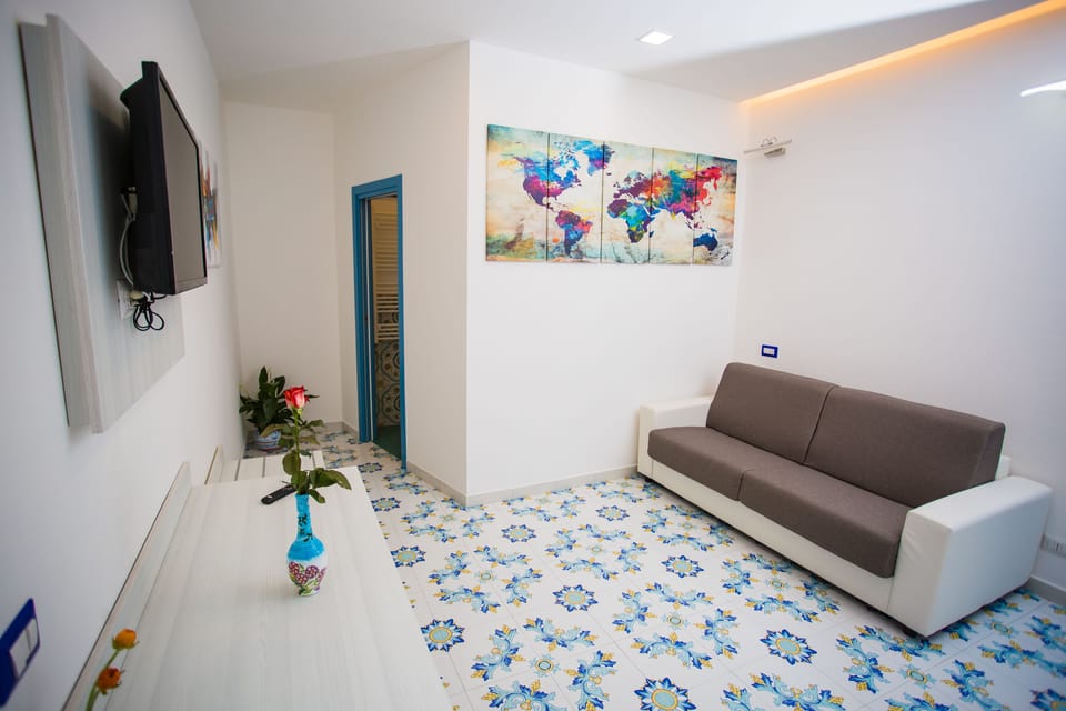 Exclusive Quadruple Room, Courtyard View (Intrigante) | Premium bedding, down comforters, memory foam beds, minibar