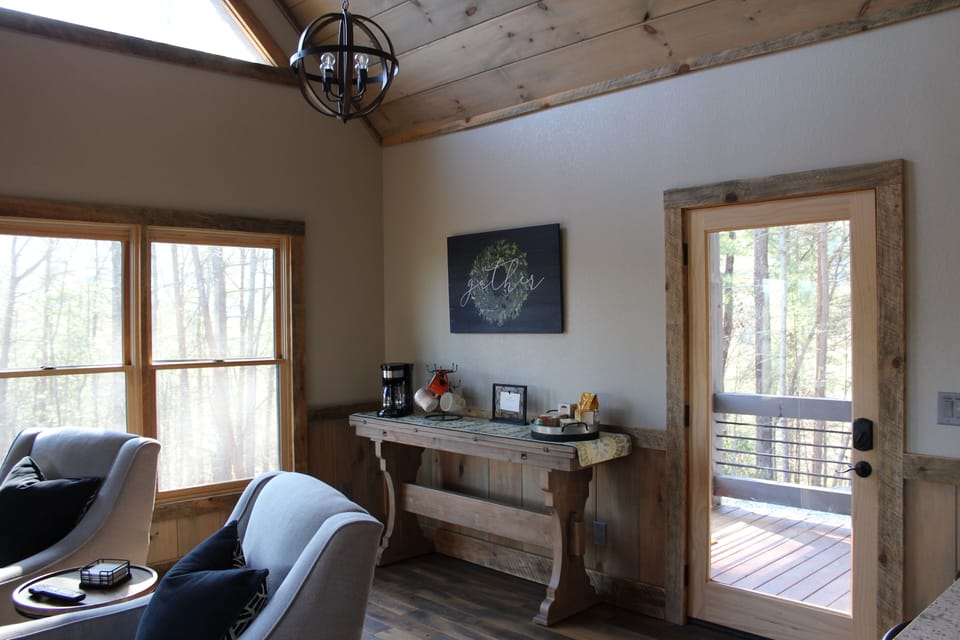 The front door opening onto the main floor and the coffee and tea bar.