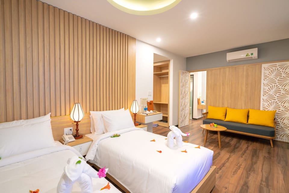 Family Quadruple Room, 2 Bedrooms | Premium bedding, minibar, in-room safe, desk