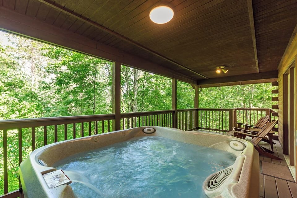 welcoming hot tub on private rear porch