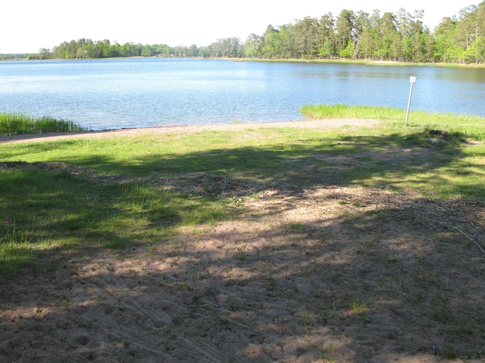 Small sand beach some 700 meters from the house