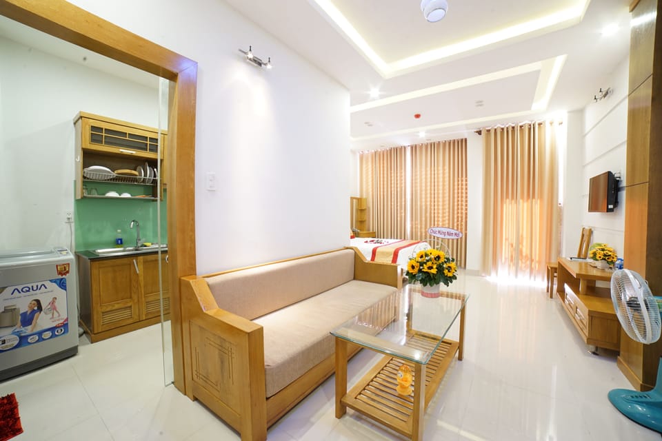 Apartment, 1 Bedroom | Living room | Flat-screen TV