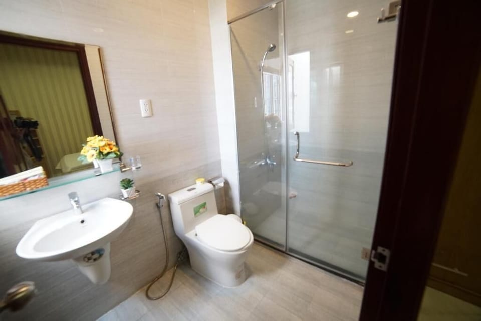 Shower, free toiletries, hair dryer, slippers