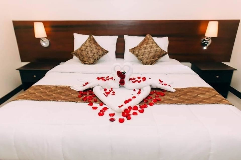 Matrimonial Room | Premium bedding, down comforters, blackout drapes, rollaway beds