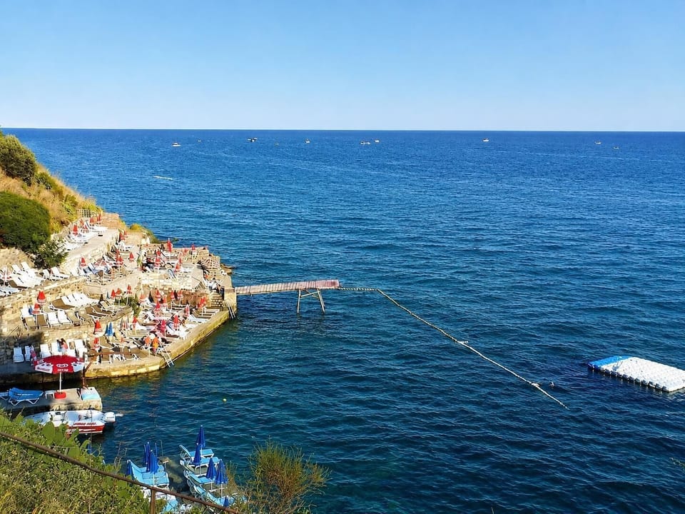 Private beach, black sand, free beach shuttle, free beach cabanas