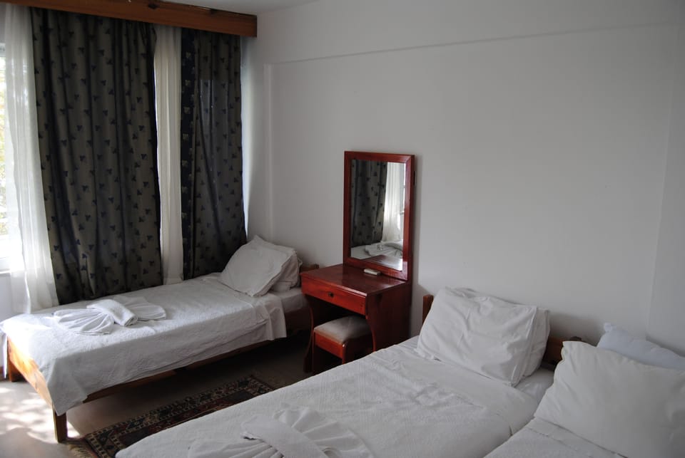 Standard Triple Room | 1 bedroom, in-room safe, desk, blackout drapes