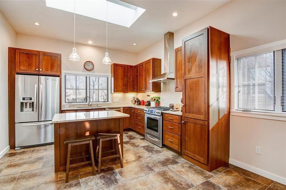 You will never run out of cabinet space or countertop space in this home!