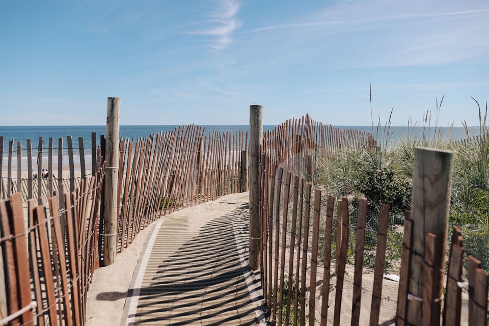 Beautiful oceanfront home offering beachfront living, soothing ocean breezes, and private beach access just steps from your door.