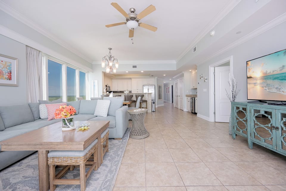 Unwind after a day at the beach in this living space on a cozy sofa with a queen sleeper and enjoy a good movie