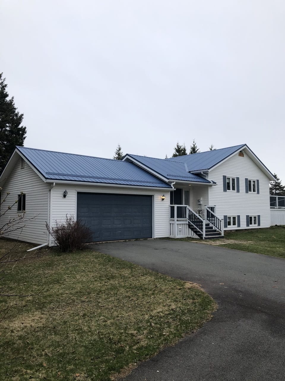 Front of house from driveway.
